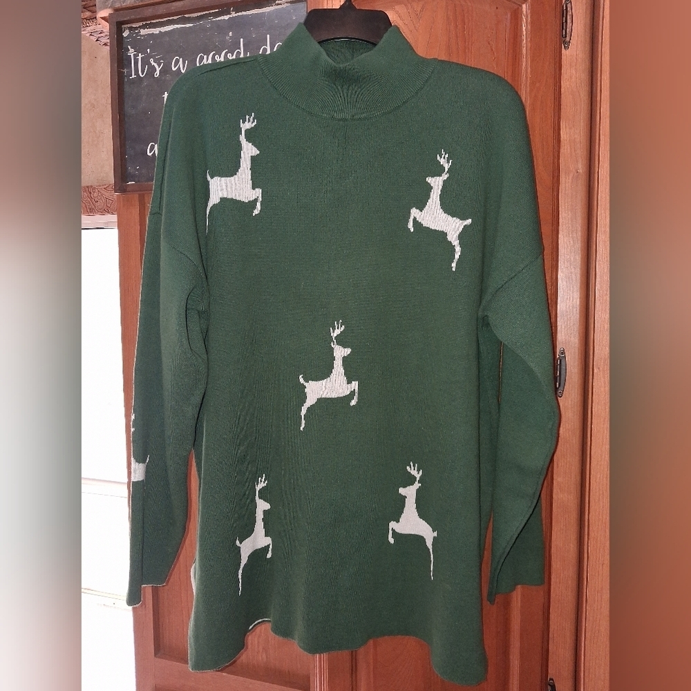 Jingle Belles Green Sweater with White Reindeer Design In A Size Large. EUC